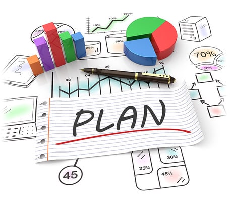 На аркуші паперу написано "PLAN" червоним кольором. Поряд розташовані кольорові графіки: гістограма з блакитними, зеленими та фіолетовими стовпчиками, кругова діаграма зеленого та червоного кольорів, а також чорна ручка.